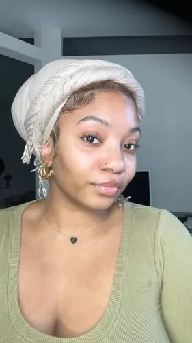 try on this elegant white headscarf styled in a twisted and wrapped design