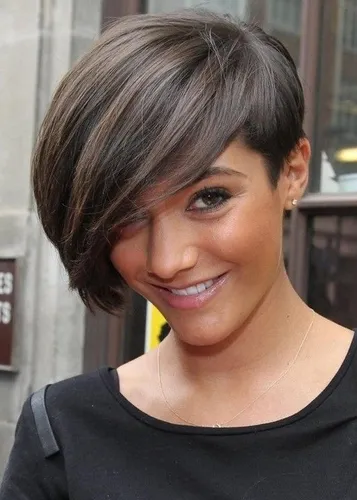 Try on this stylish asymmetrical short hairstyle, featuring sweeping bangs that partially cover one side of the forehead, adding a trendy and edgy look.