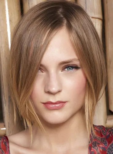 Try on this straight, medium-length hairstyle featuring a side part and light layers that gently frame the face.