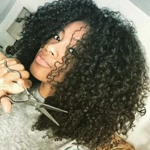 try on this voluminous curly hairstyle