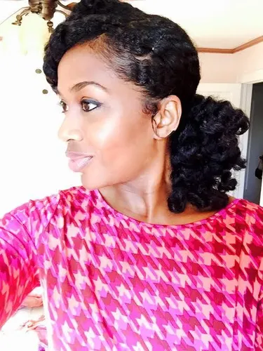 Try on a hairstyle consisting of elegant side-swept braids with curly ends, adding a soft and feminine touch.