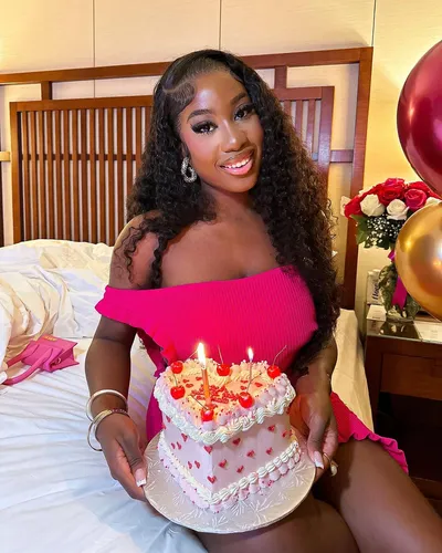 Try on this glamorous wavy, long hairstyle, featuring elegantly cascading waves that add a touch of sophistication.