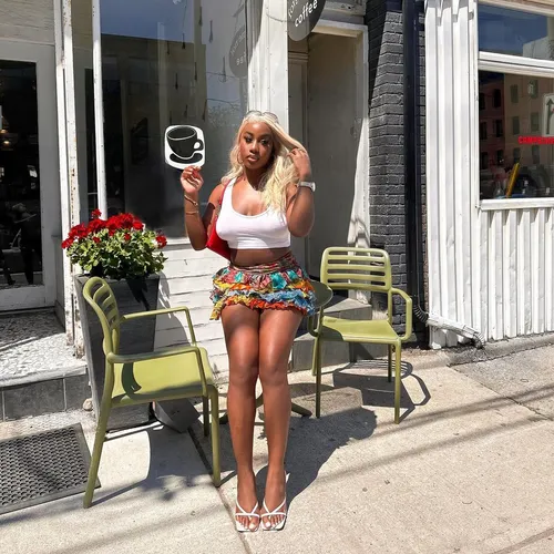 Try on this sleek blonde hairstyle, falling straight around the shoulders and styled for a chic, effortless look.