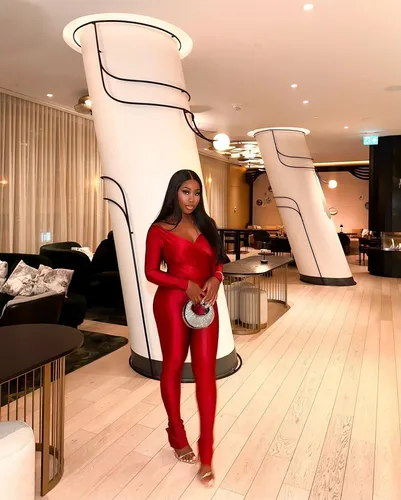 Try on this sleek, straight hairstyle that flows gracefully down, pairing elegantly with formal attire.