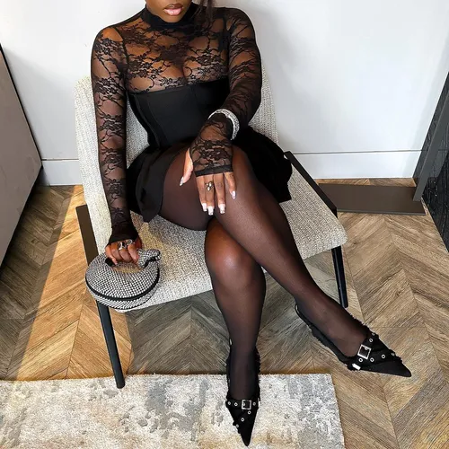 Try on a stylish short hair look as seen on the woman seating in an elegant pose