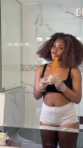 Try on this wavy, medium length hairstyle in a casual setting.