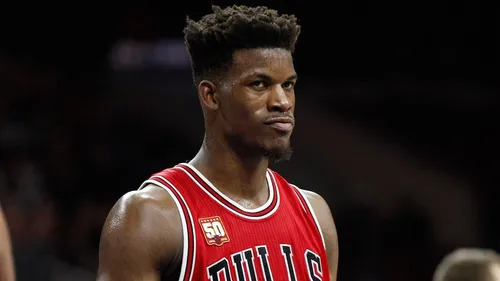 Try on this distinct high-top fade hairstyle, featuring a neatly sculpted and vertical rise of hair.