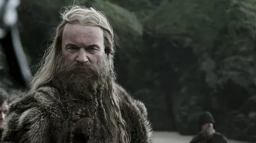 Try on a style with long flowing hair and a thick, full beard.