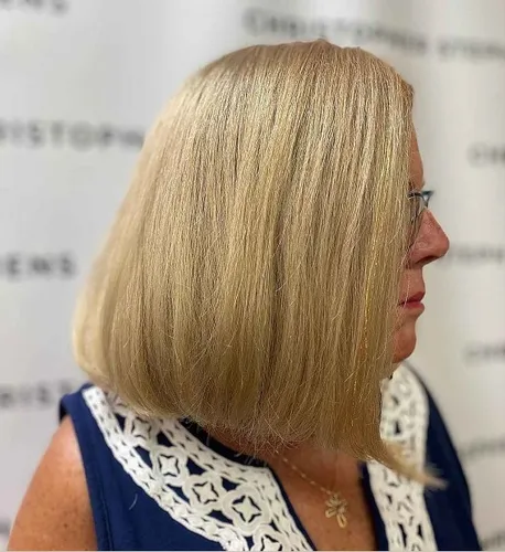 Try on this sleek blonde bob hairstyle, neatly cut just above the shoulders with a smooth texture.