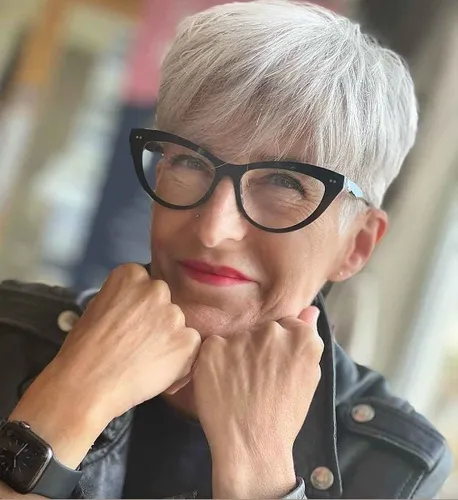 Try on a stylish short gray hairstyle, neatly combed and maintained.