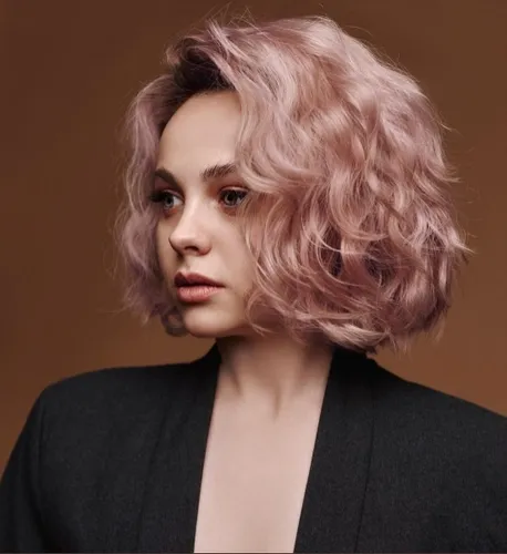 Try on this shoulder-length wavy hairstyle in a soft pink hue, perfect for adding a touch of elegance and style.