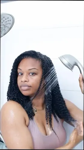 Try on this hairstyle featuring long, wet twists that cascade around the shoulders, offering a dynamic and textured appearance suitable for various occasions