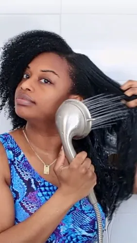 try on long straight hairstyle being styled with a hair dryer