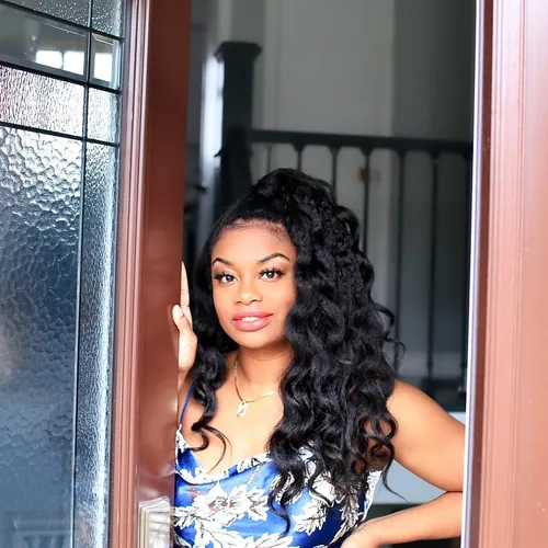 try on a hairstyle featuring long, voluminous curly hair cascading down the back