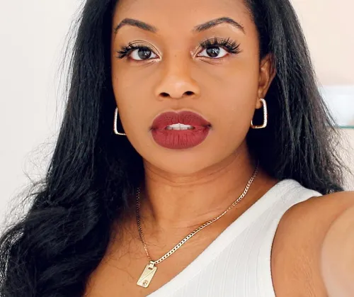 Try on a hairstyle with long, straight hair cascading past the shoulders, providing a sleek and elegant look.