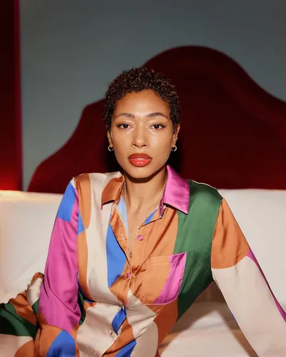 Try on a hairstyle with short curly hair, styled close to the scalp with defined, springy curls