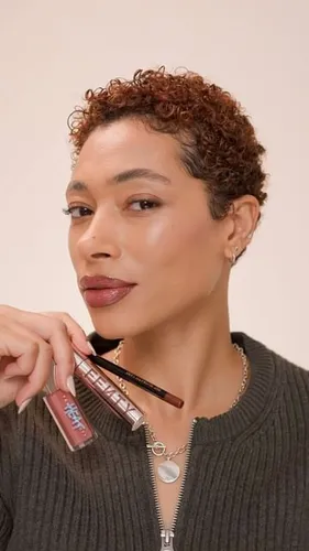 Try on this stylish short curly hairstyle