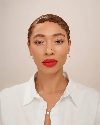 Try on this slicked back hairstyle, featuring neatly brushed back hair that provides a polished and sophisticated appearance.