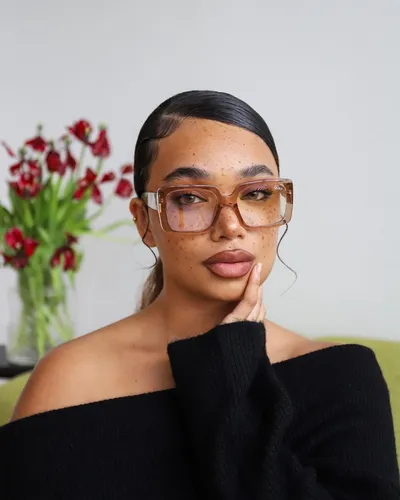 try on a slicked-back, low ponytail hairstyle