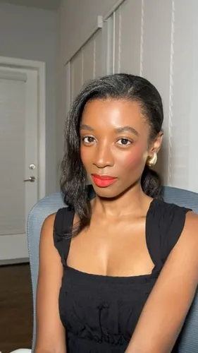 Try on this shoulder-length wavy hairstyle in a dark color, suitable for various occasions.