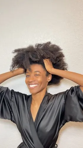 try on a voluminous afro hairstyle