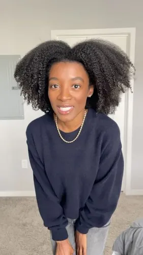 Try on a fluffy, voluminous afro hairstyle