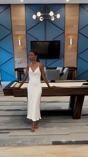 Try on a sleek, short hairstyle with neatly styled sides, perfect for a modern and elegant appearance.