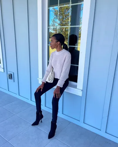 Try on a slicked back hairstyle with a neat, high bun at the back, giving a sleek and elegant appearance.