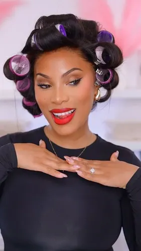 try on hair in rollers, featuring a person with various hair rollers in their hair, set for styling