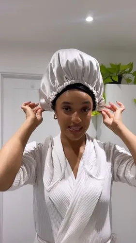 Try on a large white shower cap fitted snugly over the head