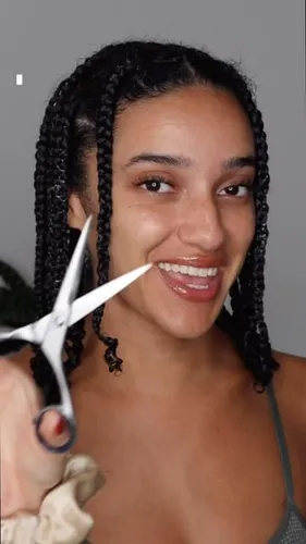 Try on the twist braids hairstyle; the person has numerous tightly twisted braids.