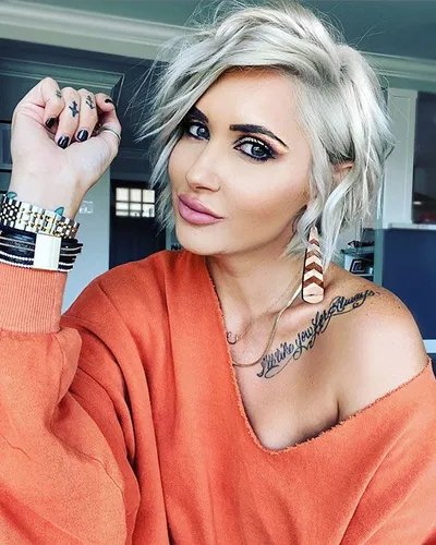 Try on a short and tousled blonde hairstyle