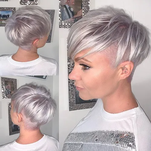 Try on this stylish short pixie cut featuring a side swept bang and tapered neckline, showcasing a modern and edgy look with subtle highlights.