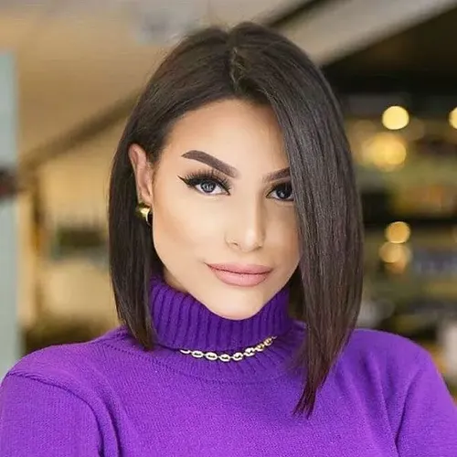 Try on a sleek straight bob hairstyle as seen on the woman in the image.