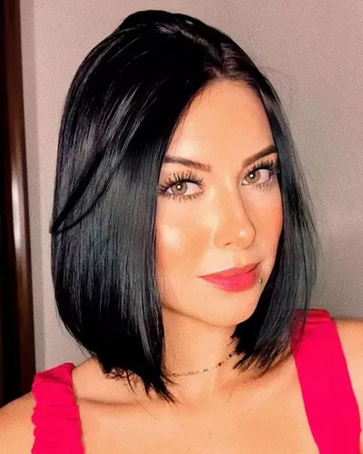 Try on a silky black, short hairstyle featuring a sleek texture and a subtle side part, neatly cut around the jawline to enhance the sharpness of the style.