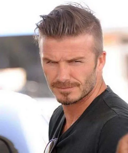 Try on a slicked back hairstyle with styled up at the front, adding a modern touch to the classic look.