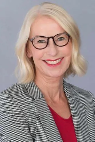 Try on a sleek, short blonde hairstyle featuring a stylish bob cut that perfectly frames the face, ideal for professional settings.