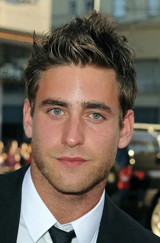 Try on this spiky hairstyle featuring hair styled upwards and forwards for a textured and voluminous look.