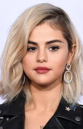 Try on this trendy, textured bob cut with blonde highlights, providing a chic and stylish look, ideal for fashion-forward individuals.