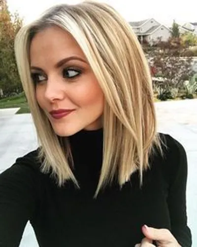 Try on the sleek bob hairstyle in this example, featuring even length and a smooth texture