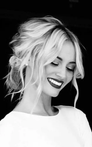 Try on a hairstyle featuring a blonde messy updo, capturing a playful and chic look.