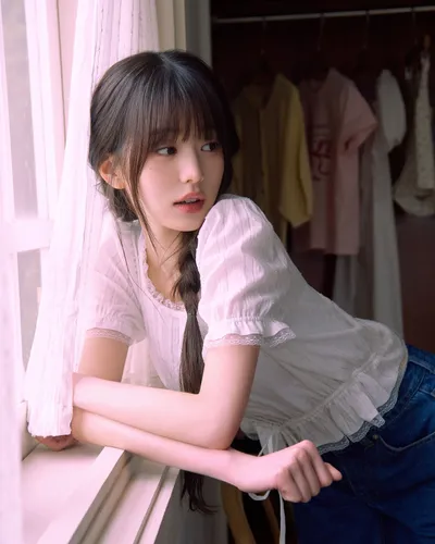 try on this long braid hairstyle, neatly fashioned and draped over one shoulder