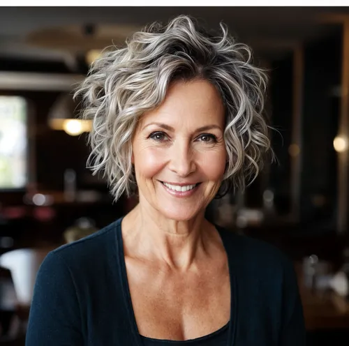 Try on this elegant short and curly salt-and-pepper hairstyle.