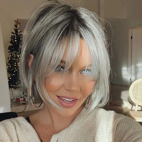 Try on this fashionable silver bob cut hairstyle with chin-length strands framing the face.