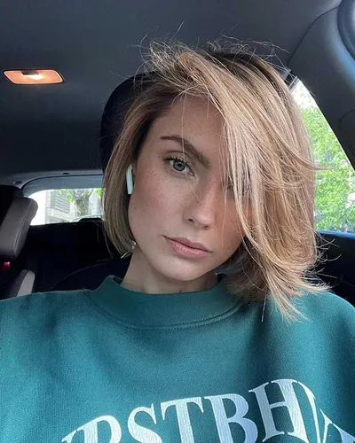 try on a chic short hairstyle with layers, perfect for a fresh and modern look
