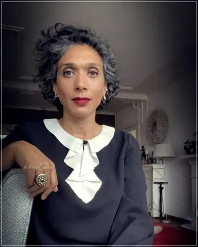 Try on a stylish short, wavy grey hairstyle