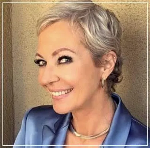 Try on this short, blonde hairstyle featuring a pixie cut with side-swept bangs that gracefully frame the face