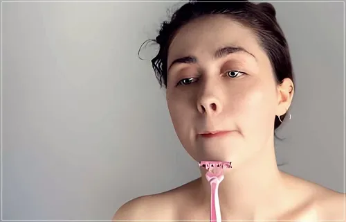 Try on an updo hairstyle with side part on a woman positioned face forward, featuring a subtle, neat look with hair pulled back from the face and gathered at the back.