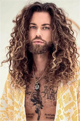 Try on this style featuring a man with long, curly hair and a full beard.