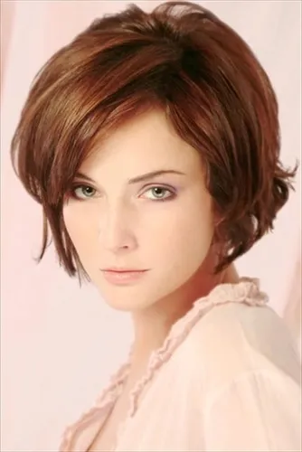 Try on this chic short layered hairstyle on a woman with a slight sideways glance.